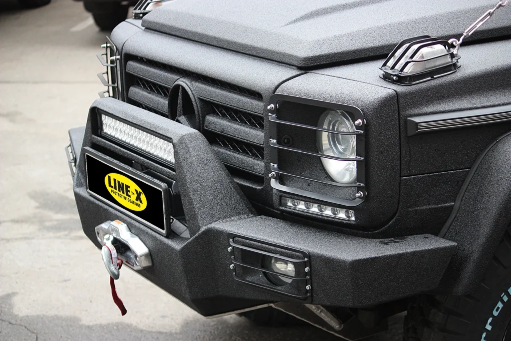Тюнінг-проєкт MB G-class Gelendwagen захищений Line-X. Передній силовий бампер та захист передніх фар.